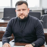 Євген Кузик Logo